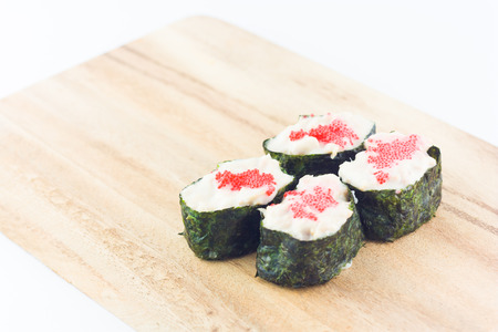 sushi in wooden plate on white backgroundの写真素材