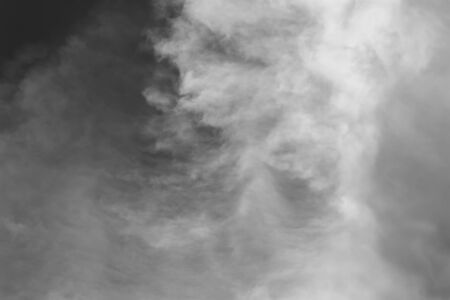 black and white clouds : smoke on skyの写真素材