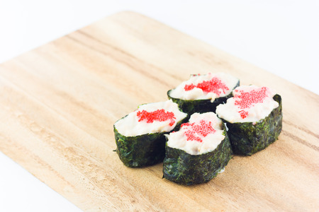 sushi in wooden plate on white backgroundの写真素材