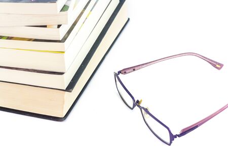 book and glasses on white backgroundの写真素材