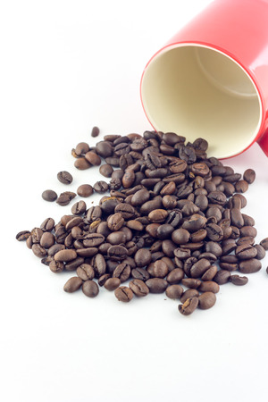 coffee cup and coffee beans on white backgroundの写真素材