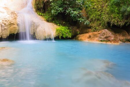 seventh leval of Erawan Waterfall in Erawan national park in Kanchanaburi, Thailand : one of the most famous place for holidays and relaxingの写真素材