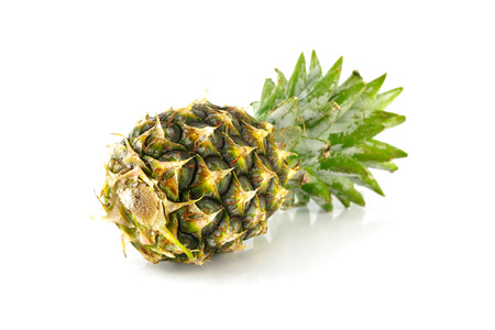 ripe pineapple on white background