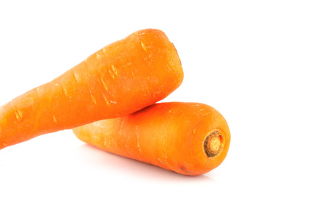 fresh carrots on white backgroundの写真素材