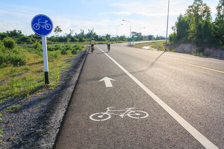 cycling on the road in country sideの写真素材