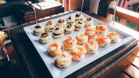 appetizers mini bread with various topping bite sizeの写真素材