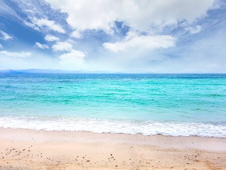 wave on brown sand beachの写真素材