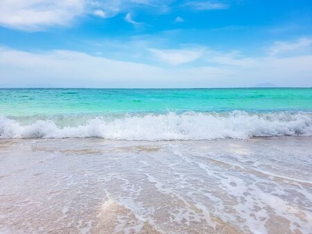 wave on brown sand beachの写真素材