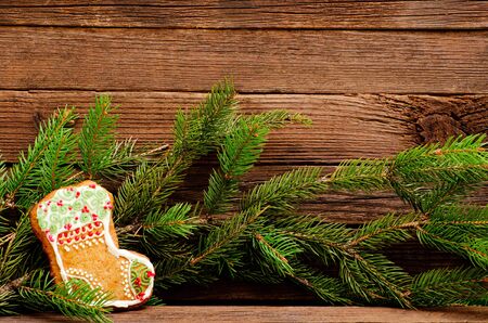 Gingerbread stocking and fir branch, place for text