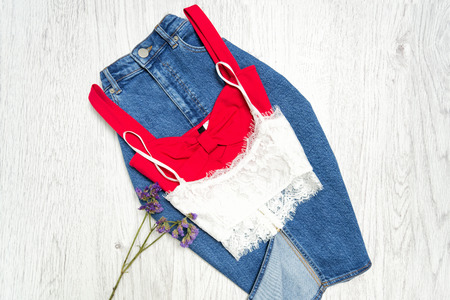 Jeans skirt, red and white top, collage. Fashionable concept.の写真素材