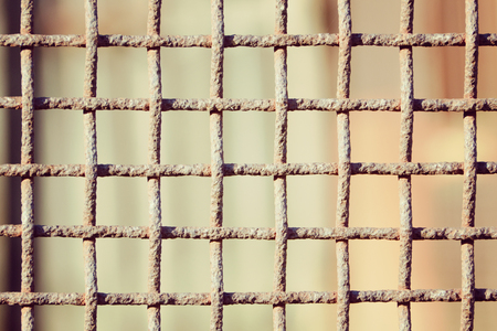 Rusty cage close up. Blurred Backgroundの写真素材