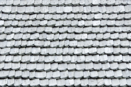 Old roof with wooden shingles. Texture. Close-upの写真素材