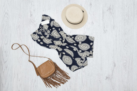 Summer romper, handbag and hat. Fashionable concept
