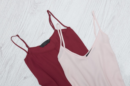 Pink and burgundy tank top. Fashionable concept. Close up