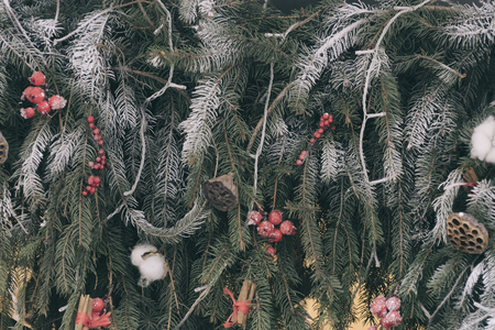 Snow-covered Christmas tree with decorations. New Year's conceptの写真素材