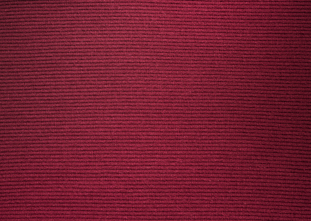Backgrounds and textures. Maroon knitted fabric. Fine knit.の写真素材