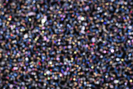 Texture of black cloth with colorful sequins. Close-up.の写真素材