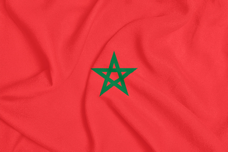 Flag of Morocco on textured fabric. Patriotic symbolの写真素材