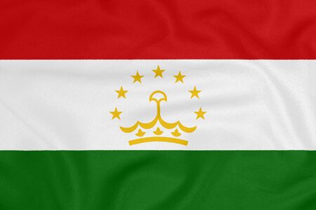 Flag of Tajikistan on textured fabric. Patriotic symbolの写真素材