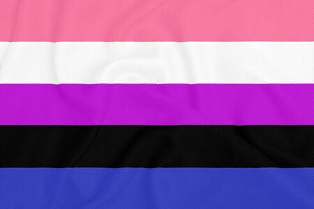 LGBT genderfluid pride community flag on a textured fabric. Pride symbolの写真素材