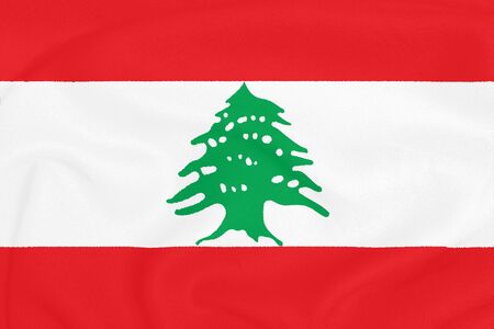 Flag of Lebanon on textured fabric. Patriotic symbolの写真素材