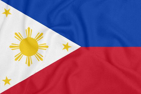 Flag of Philippines on textured fabric. Patriotic symbolの写真素材