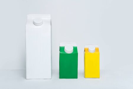Three carton box or packaging with a cap on a white background.の写真素材