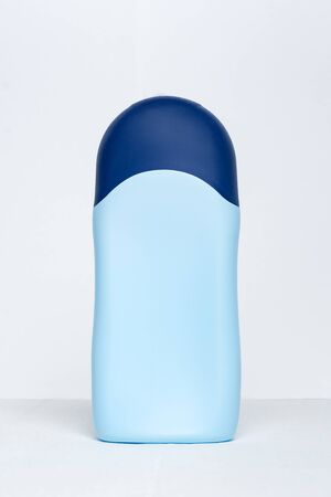 Blue bottle for cosmetic product. Mockup. White backgroundの写真素材