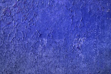 Cracked purple paint Seamless old texture backgroundの写真素材