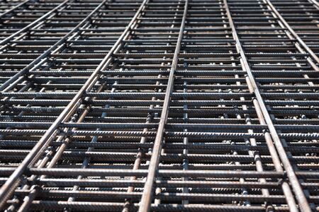 Steel Rebars for reinforced concrete construction site. Piled iron reinforcement workpieces
