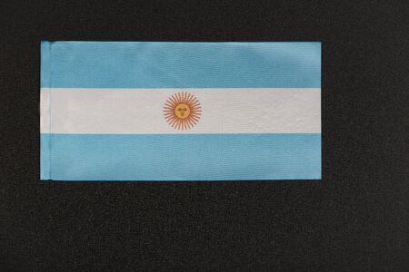 Flag of Argentina on black background. National symbol of Argentine Republic.の写真素材