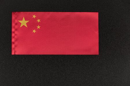 Flag of Peoples Republic of China on black background. National symbol of China.の写真素材