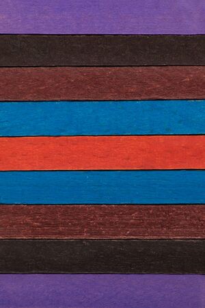 Colorful wooden planks. Multicolor background. Vertical frame.の写真素材