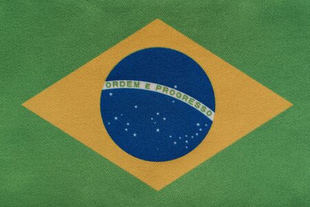National emblem of Federative Republic of Brazil. Flag of Brazil on close up. Ordem e Progresso.の写真素材