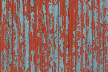 Wooden surface with old paint. Old wooden wall or fence. Texture background, retro wood planks.