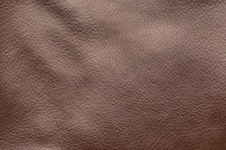 Brown smooth leather surface. Close-up. Texture background.の写真素材