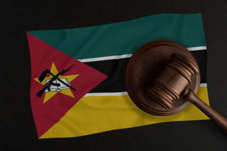 Judges hammer and the flag of Mozambique. Law and Justice. Constitutional law.の写真素材