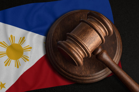 Judge Gavel and flag of Philippines. Law and justice in Republic of the Philippines. Violation of rights and freedoms.の写真素材