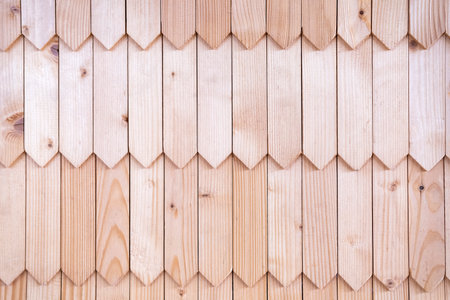 Abstract geometric wooden background. Light natural wood with natural pattern. Board, lumberの写真素材