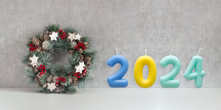 Traditional Christmas wreath and colored number 2024 on gray background. New year. Winter Holiday pattern.の写真素材