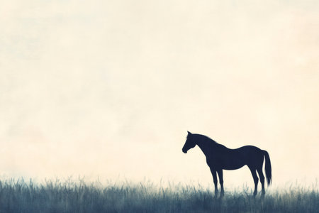 Minimalist artwork featuring the silhouette of a horse standing peacefully in a field of tall grass, bathed in the warm glow of the setting sunの素材