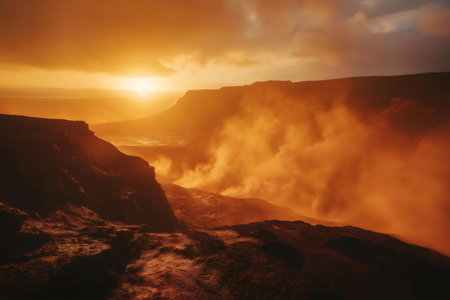 Warm sunlight bathing a volcanic crater in Iceland, highlighting steam rising dramatically against a backdrop of mountains and evening skyの素材