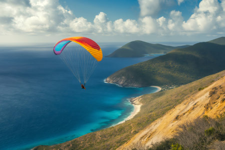 Soaring high above a stunning tropical island, showcasing vibrant turquoise waters and lush greenery, creating an unforgettable adventureの素材