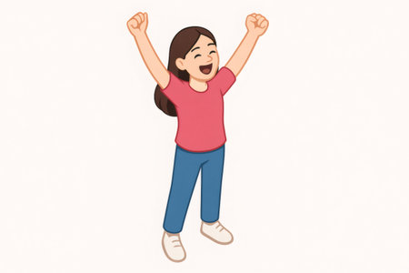Cheerful young girl feeling happy and celebrating a victory or achievement with arms raised and fists pumpingの素材