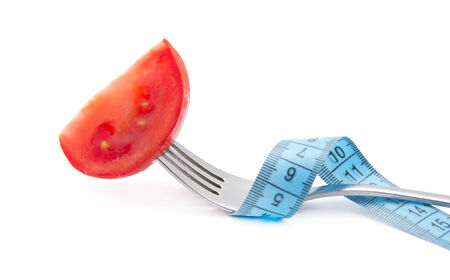 cherry tomatoes on a forkの写真素材