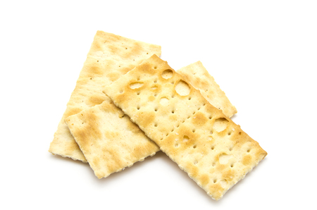 Salty crackers in square shape on white backgroundの写真素材