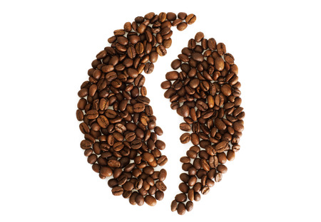 Brown coffee beans isolated on white backgroundの写真素材