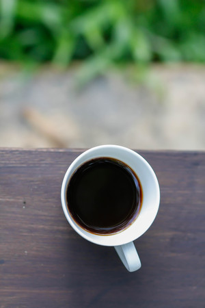 black coffee on the wooden tableの写真素材