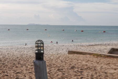 Lamps on the sand 
with sea backgroundの写真素材