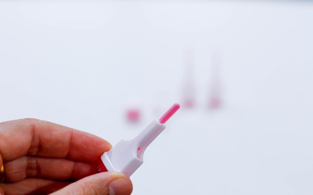 auto lancet on handの写真素材